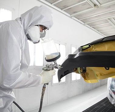 Collision Center Technician Painting a Vehicle | Don Moore Toyota in Owensboro KY